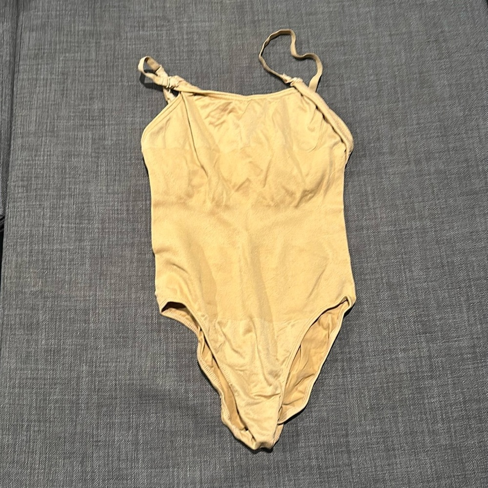 Adult small revolution bodysuit